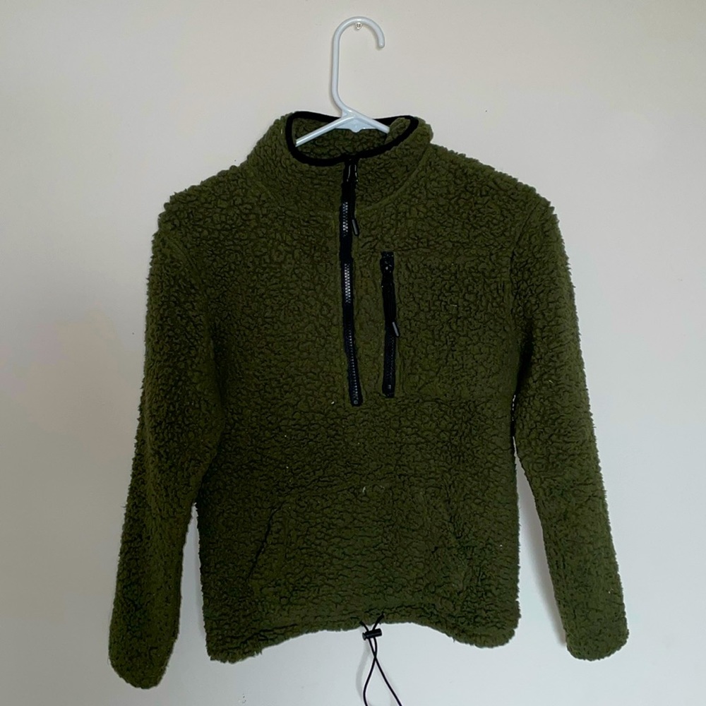This is a XS No Boundaries green sweatshirt.